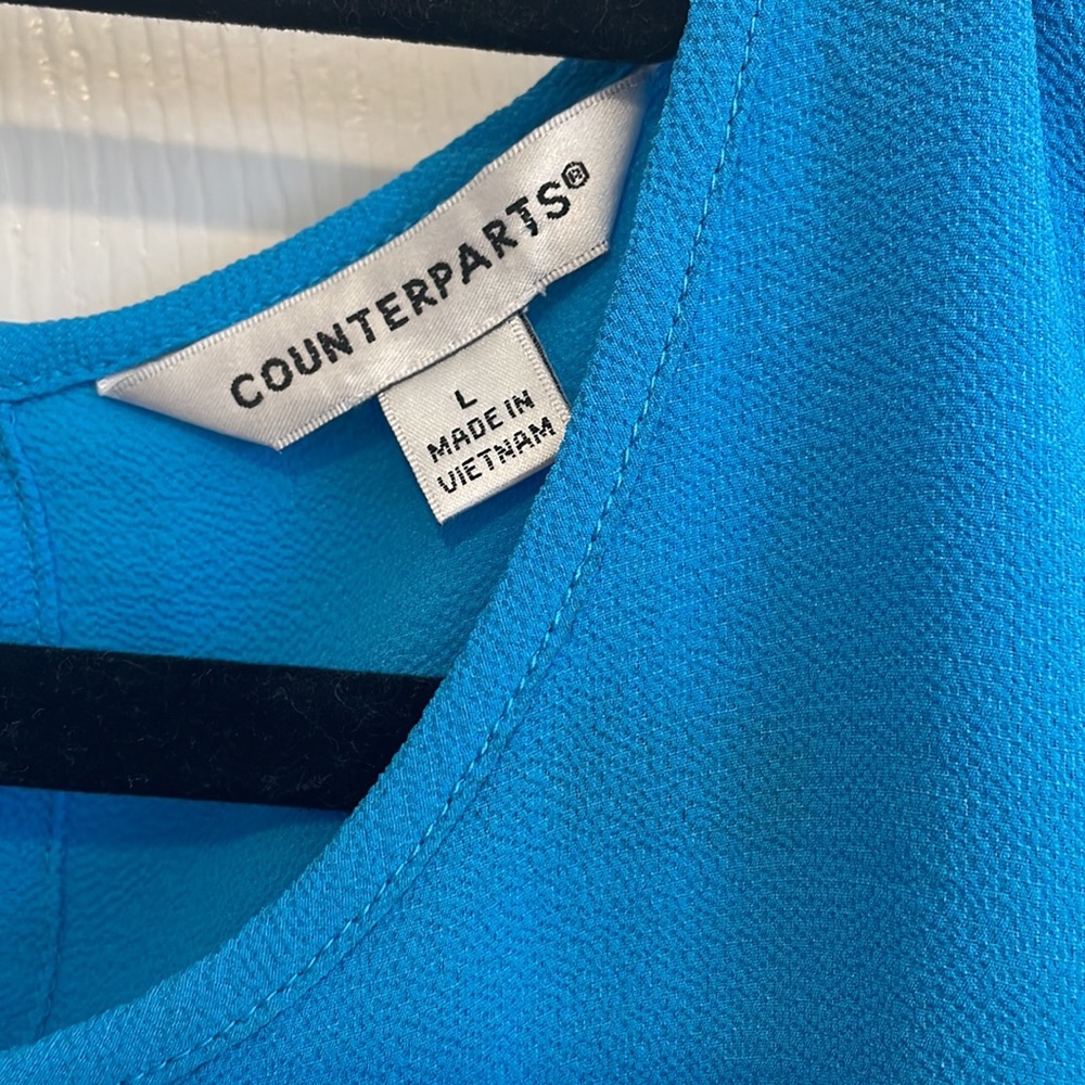 Turquoise ruffle sleeveless top - Picture 2 of 6